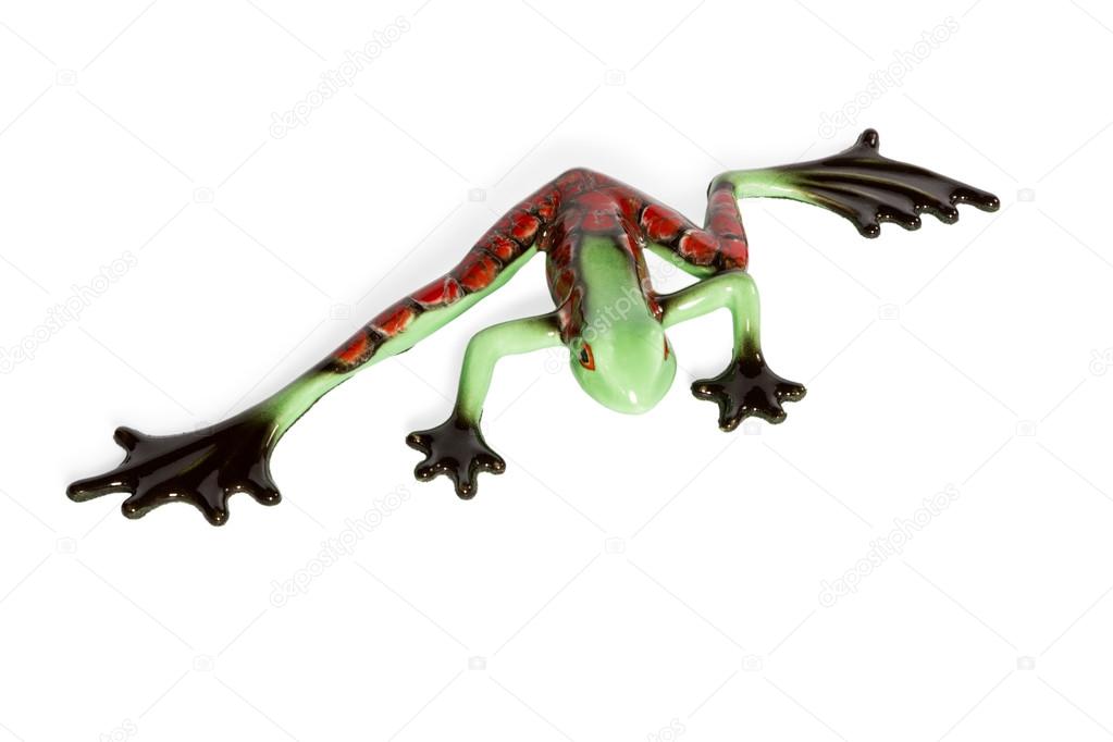Statuette of a green frog with red spots