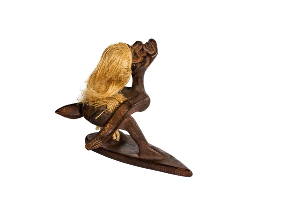 Drewnianą figurką Afryki surfer — Zdjęcie stockowe
