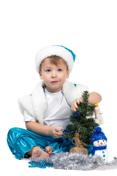 Little kid decorating Christmas tree — Stock Photo, Image