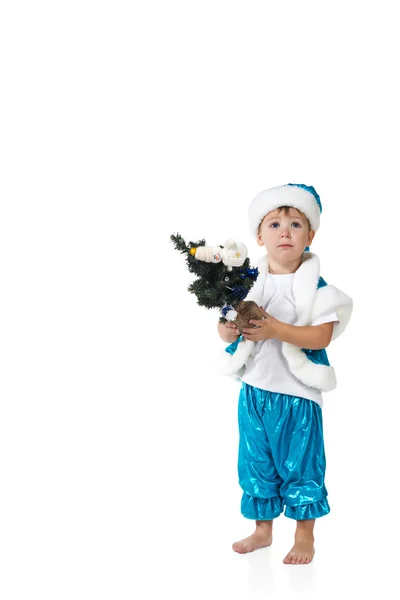 Christmas boy holding small decorated fir tree — Stock Photo, Image