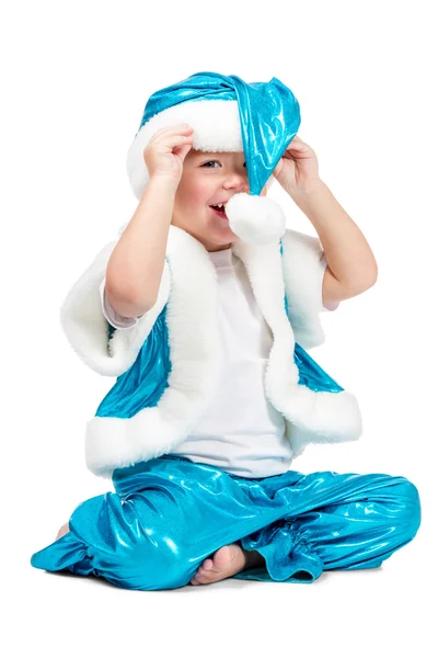 Kid Santa puts his hat — Stock Photo, Image