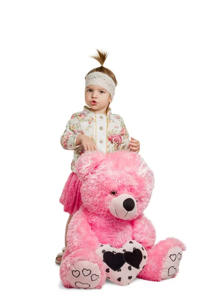 Little girl with big teddy bear — Stock Photo, Image