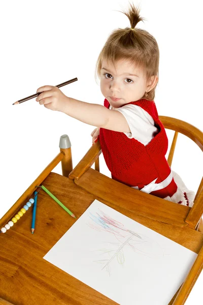 Little girl drawing showing a pencil — Stock Photo, Image