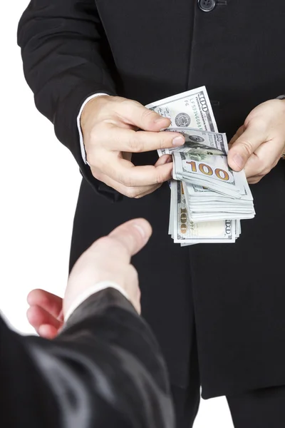 Hand reaching for money — Stock Photo, Image