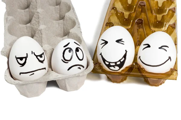 Two sad and cheerful couple eggs — Stock Photo, Image