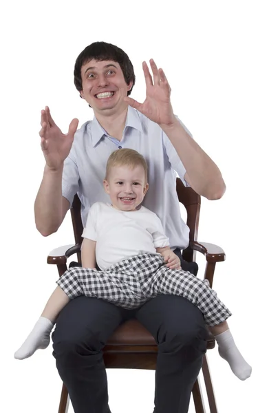 Son sits at his dad on hand — Stock Photo, Image