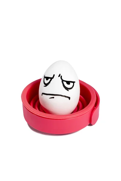 Egg with a face on stand — Stock Photo, Image