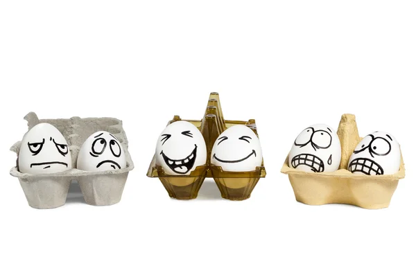 Eggs with faces funny and evil — Stock Photo, Image