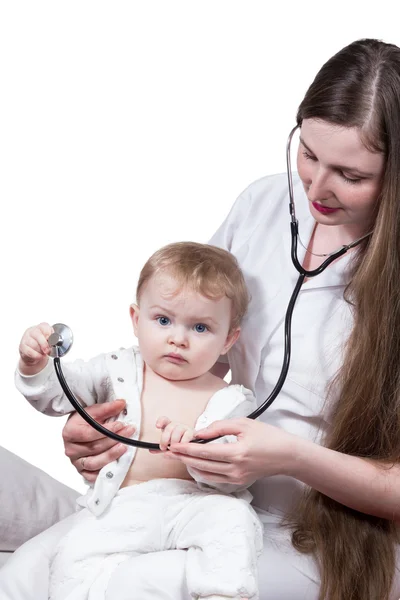 Doctor holding a baby on the hands — Stock Photo, Image