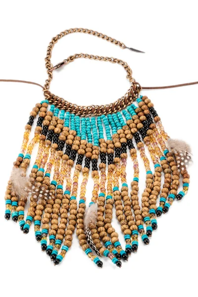 Necklace of wooden beads with feathers — Stock Photo, Image