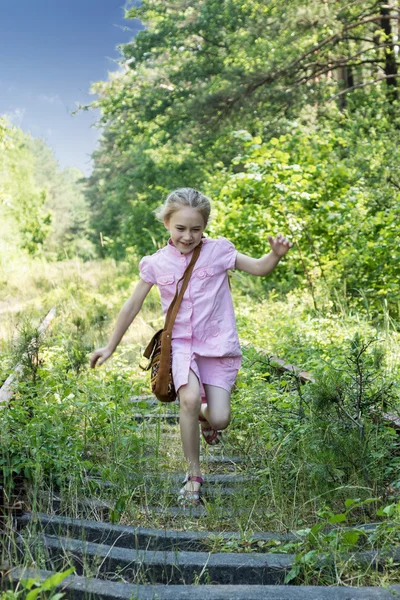 Running girl on the railway — Stock Photo, Image
