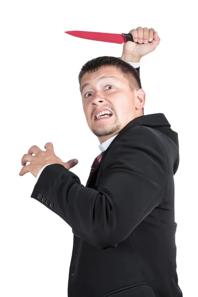 Angry businessman with a knife — Stock Photo, Image