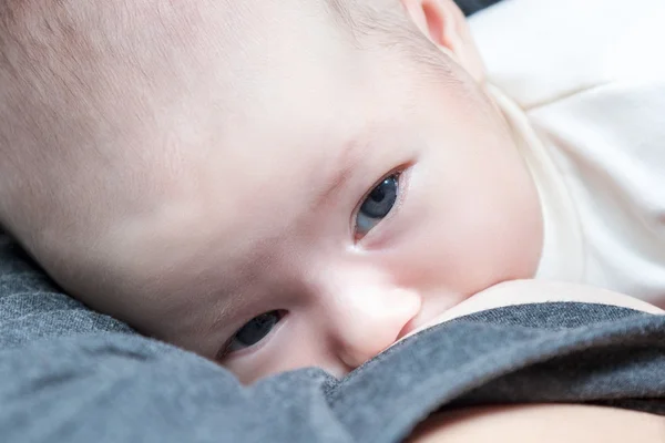 Mother is breastfeeding view from above — Stock Photo, Image