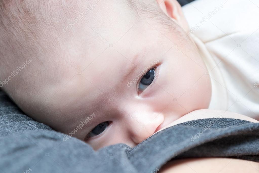 Mother is breastfeeding view from above