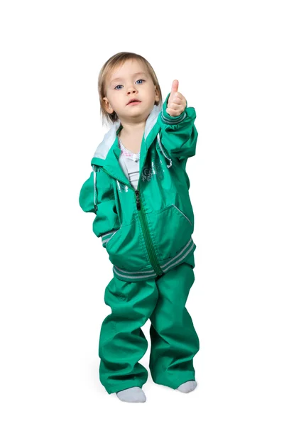 Child in sports suit raised thumb up — Stock Photo, Image