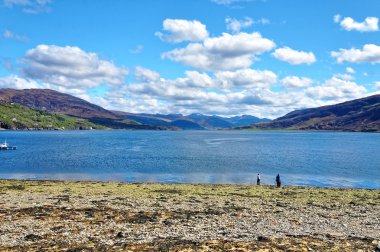 Shorefront at Ullapool in the highlands of Scotland clipart