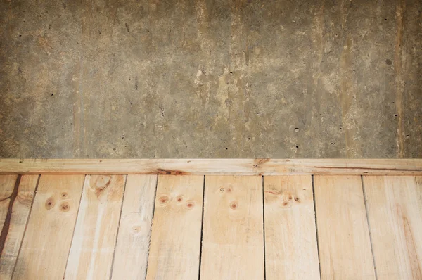 Wooden floors battens with cement background — Stock Photo, Image