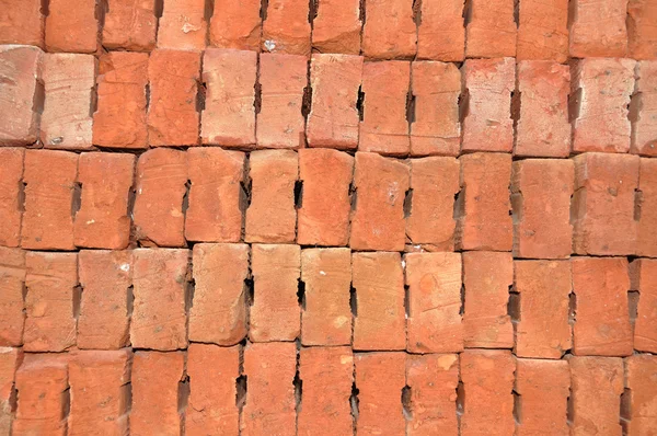 Tuğla duvar dokusunun arkaplanı.