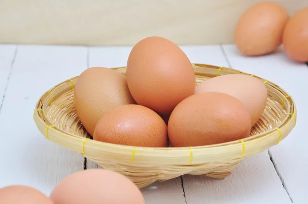 Eggs on bamboo basket. — Stock Photo, Image