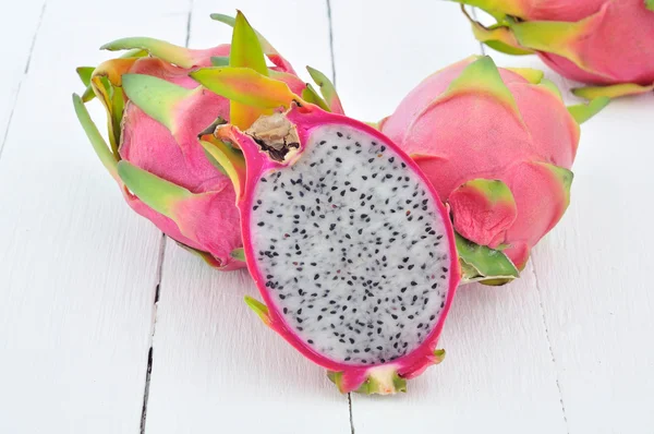 Dragon Fruit on wooden floor. — Stock Photo, Image