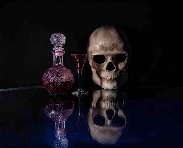 skull and skeletons of people and animals on a black background as an attribute of the holiday of the change of all the dead