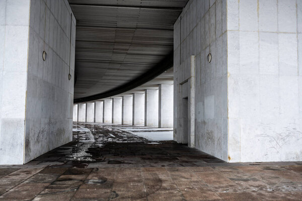 winter landscape in a city park after the first snow at the beginning of winter