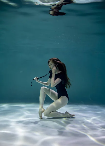 Beautiful Girl Black Swimsuit Posing Underwater Black Telephone Receiver Blue — Stock Photo, Image