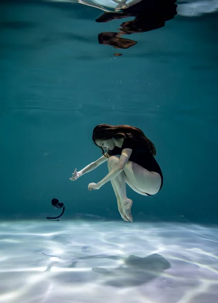 Beautiful Girl Black Swimsuit Posing Underwater Black Telephone Receiver Blue — Stock Photo, Image