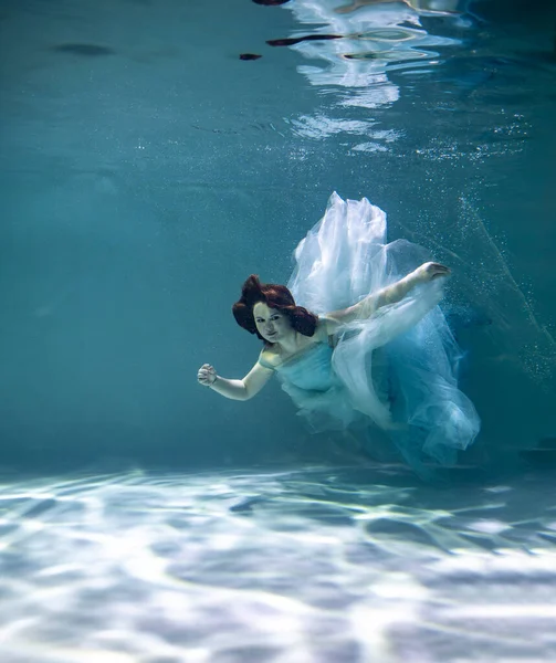 Beautiful Woman Red Hair Lush Blue Dress Posing Underwater — Stock Photo, Image