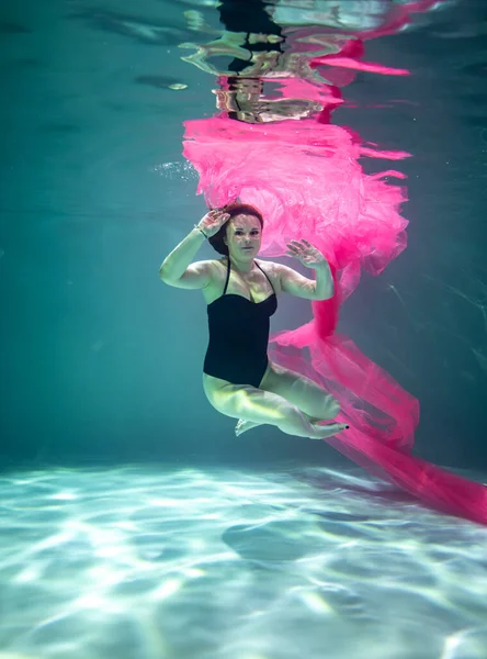 Beautiful Girl Black Swimsuit Pink Pareo Underwater Blue Background — Stock Photo, Image