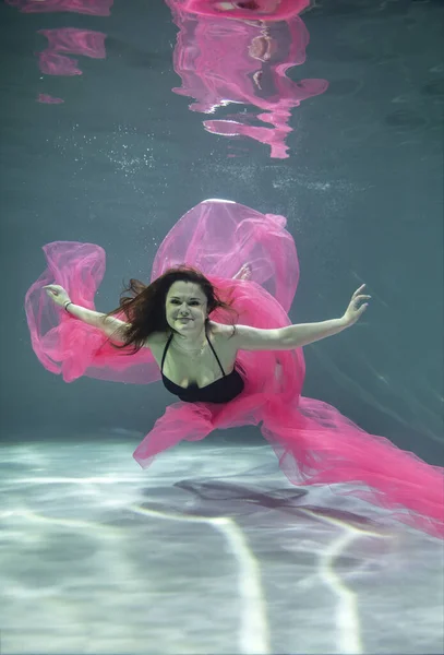 Beautiful Girl Black Swimsuit Pink Pareo Underwater Blue Background — Stock Photo, Image
