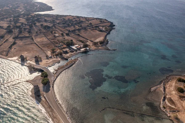 panoramic view of the old stone mills, bridge, road and sea filmed from a drone