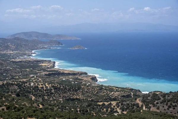 panoramic view from the mountain to the coastal seashore with bays and water of different colors