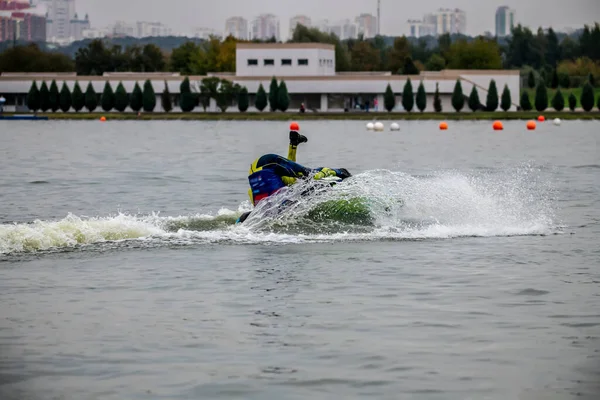 stock image competition and freestyle in the program of competitions on aquabikes in open water on the lake 