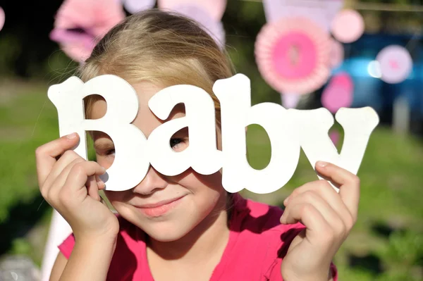 Word baby on wooden background — Stock Photo, Image