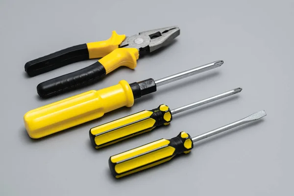 Screwdriver Pliers Screwdriver Tool Gray Background — Stock Photo, Image