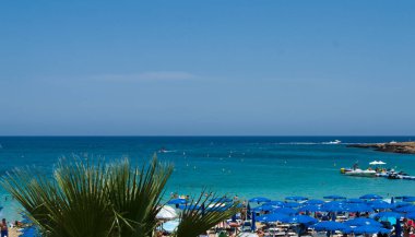 PROTARAS, CYPRUS - 16 Haziran: Seaview on the beach, Sunny day on Protaras, Kıbrıs 16 Haziran 2018. 