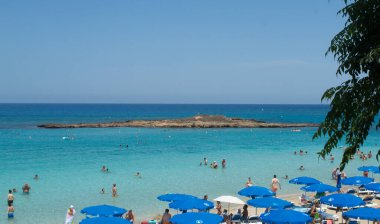 PROTARAS, CYPRUS - 16 Haziran: Seaview on the beach, Sunny day on Protaras, Kıbrıs 16 Haziran 2018. 