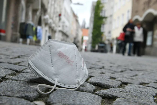 Corona crisis - lockdown - FFP2 mask lies on a street in Steyr, Austria, Europe