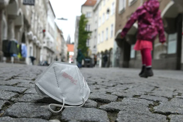 Corona crisis - lockdown - FFP2 mask lies on a street in Steyr, Austria, Europe