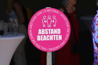 Sign for distance rule at cultural event in Austria, Europe