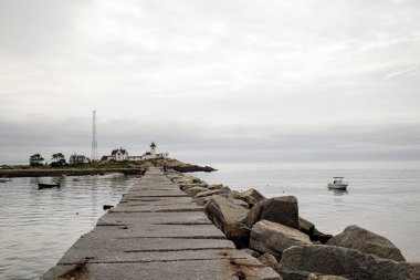 Eastern Point Lighthouse and Dogleg Breakwater clipart