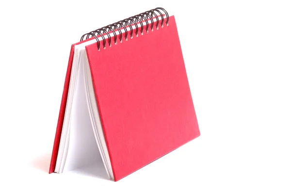 Red notebook isolated on white background — Stock Photo, Image
