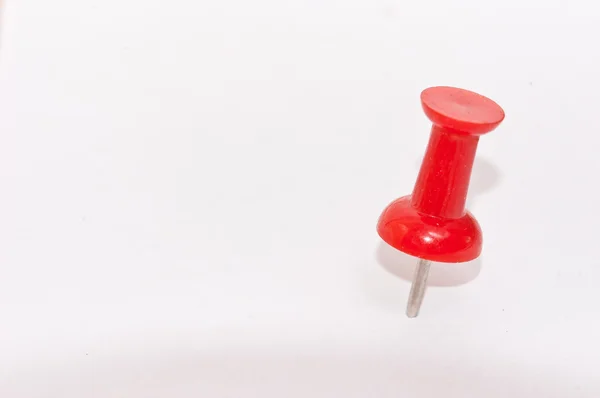 Close up of a pushpin on white fone with clipping path — стоковое фото