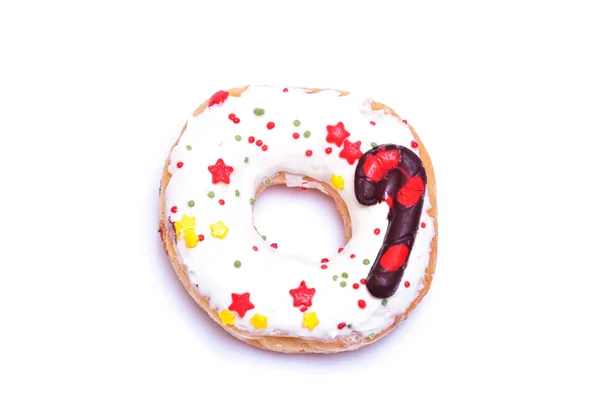 Donut dekoriert für Weihnachten auf weißem Hintergrund — Stockfoto