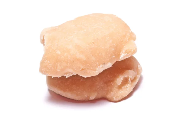 O açúcar de palma ou Jaggery em fundo branco — Fotografia de Stock