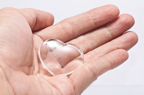 Heart in hand on white background — Stock Photo, Image