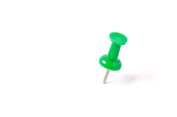 Close up of a green pushpin on white background — Stock Photo, Image