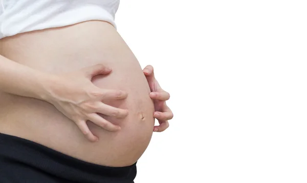 A coceira, dor de barriga grávida, Isolado contra fundo branco — Fotografia de Stock