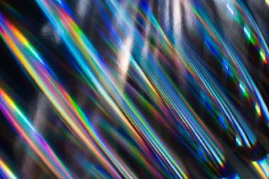 Soyut renkli holografik çizgili arka plan. Geleceğin bulanık dokusu.